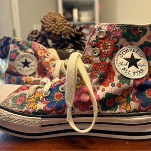 Girls converse All-Star, high top shoes.